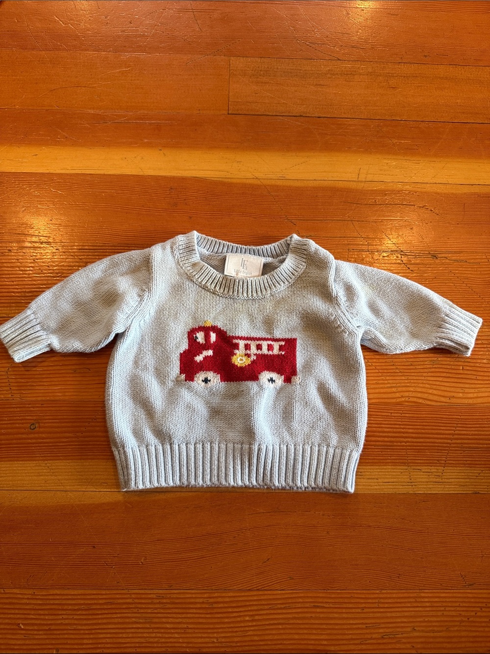 Little English Light Blue Sweater with Red Fire Truck Motif